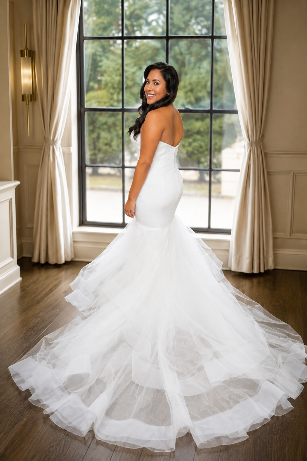 Strapless mermaid gown with tiered tulle train