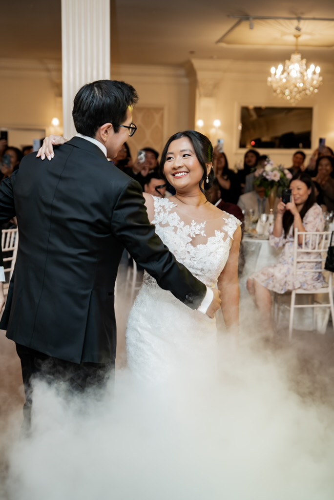 Bride in illusion lace gown during first dance