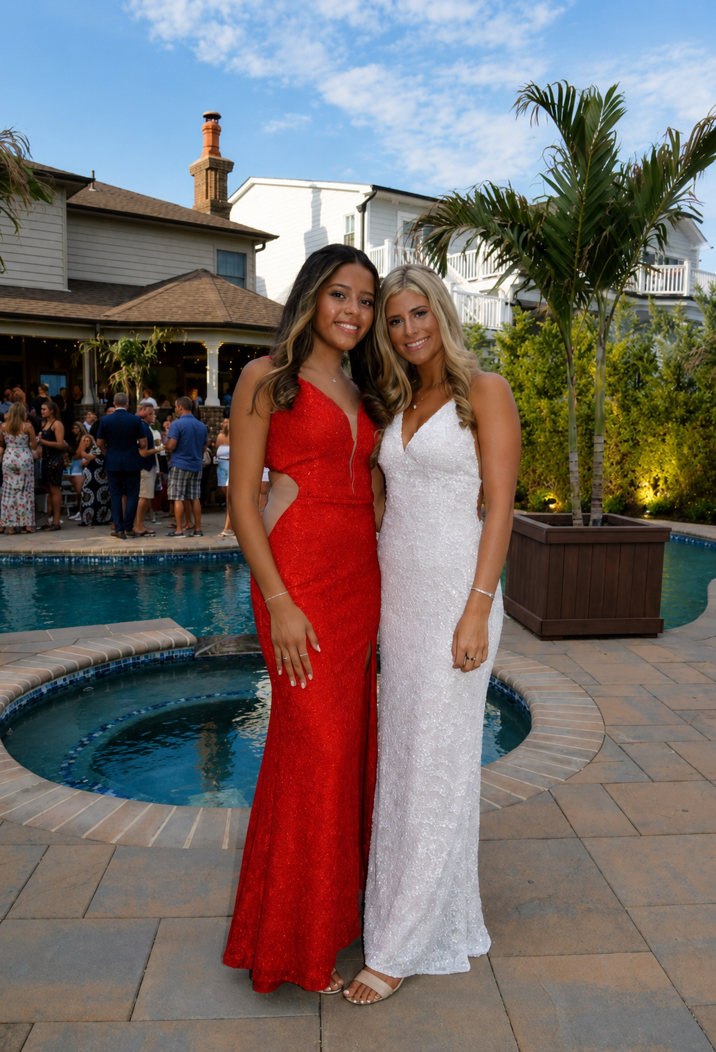 Formal evening dresses photographed poolside